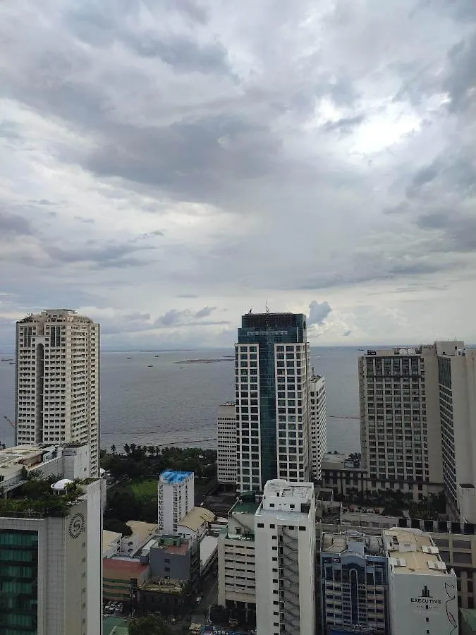 Family Room Staycation: Heart of Manila with Balcony and Pool Access